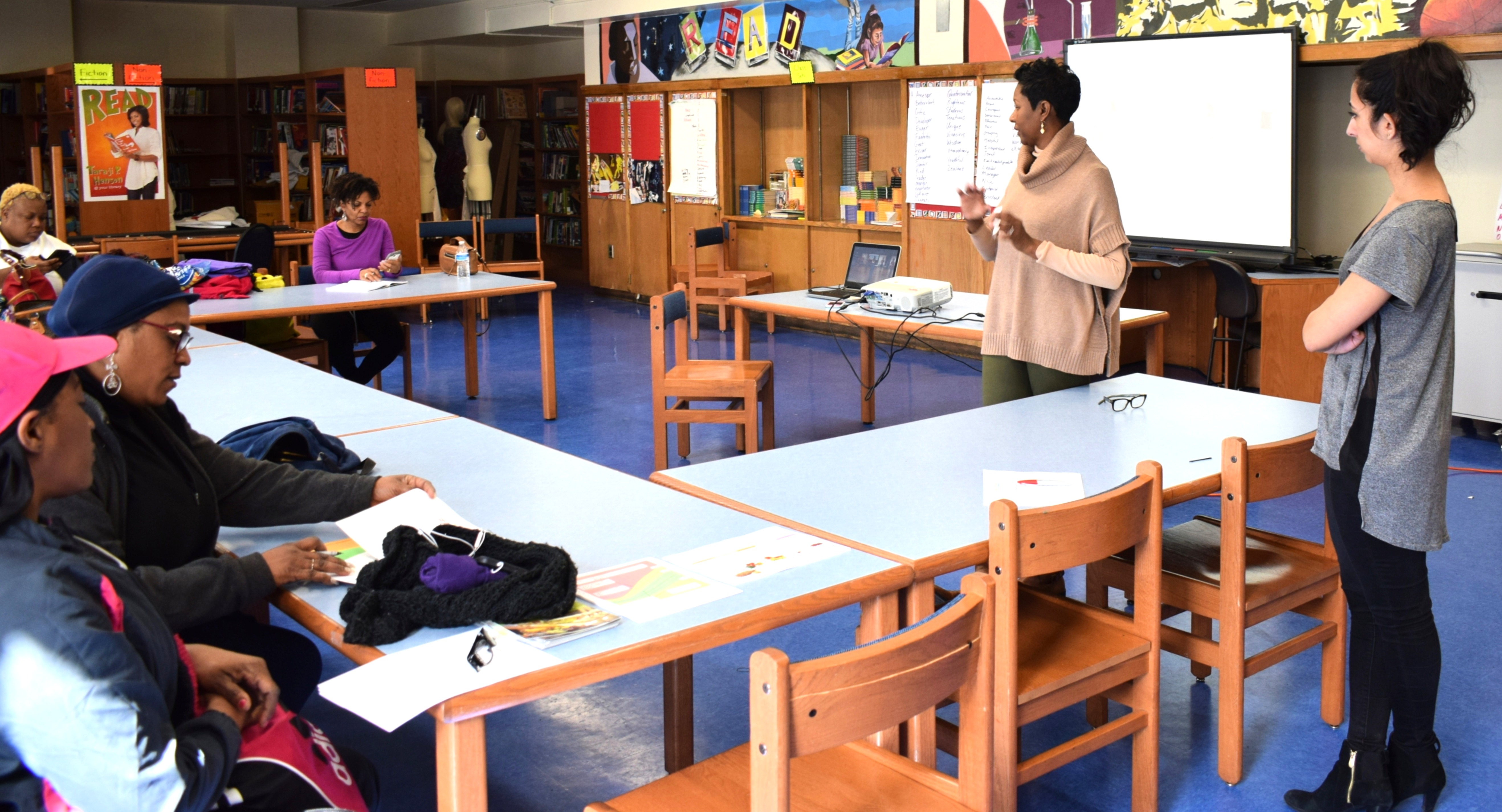 Educational parent workshop session in school setting with presenter and participants